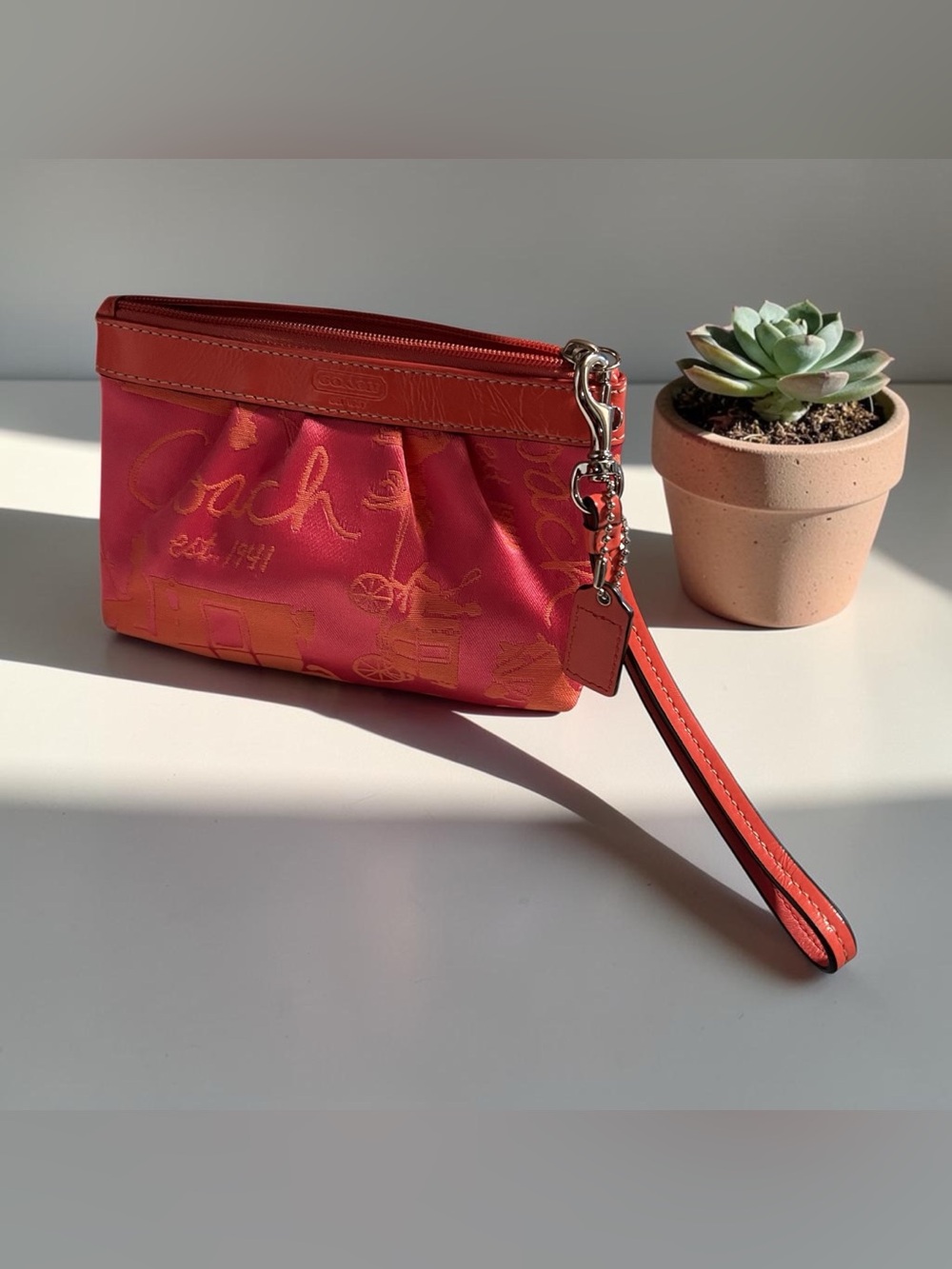 Coach Coral-Orange Signature Wristlet Clutch